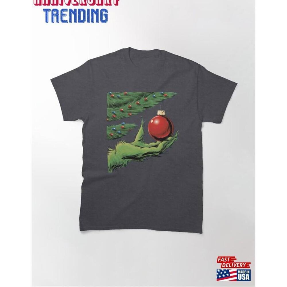Green Hand Grabbing A Christmas Bauble Classic Tshirt Unisex